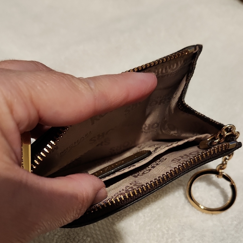 Michael Kors Black Wristlet with Rocket and Star Design - Picture 4 of 7